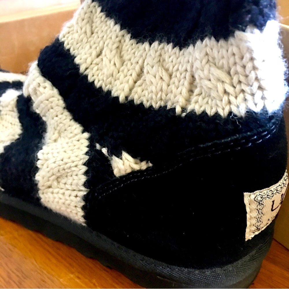 Brand New UGG Classic Tall women’s size 7 buttercream and black sweater boots!